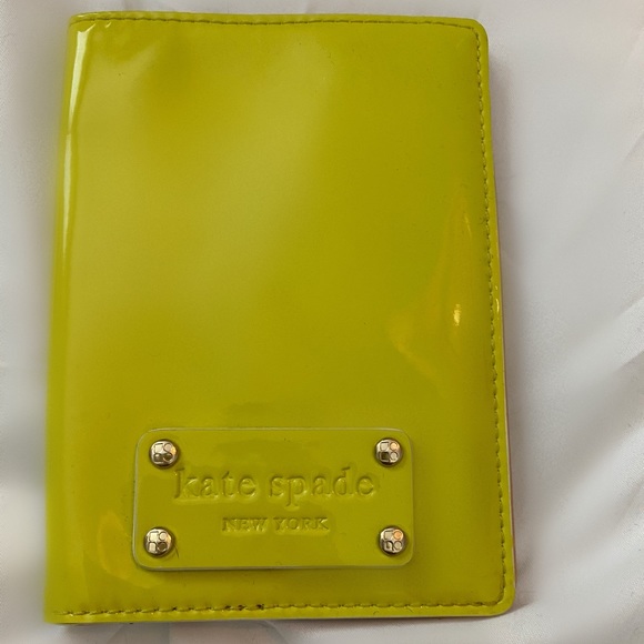 kate spade Handbags - Kate Spade patent yellow passport cover